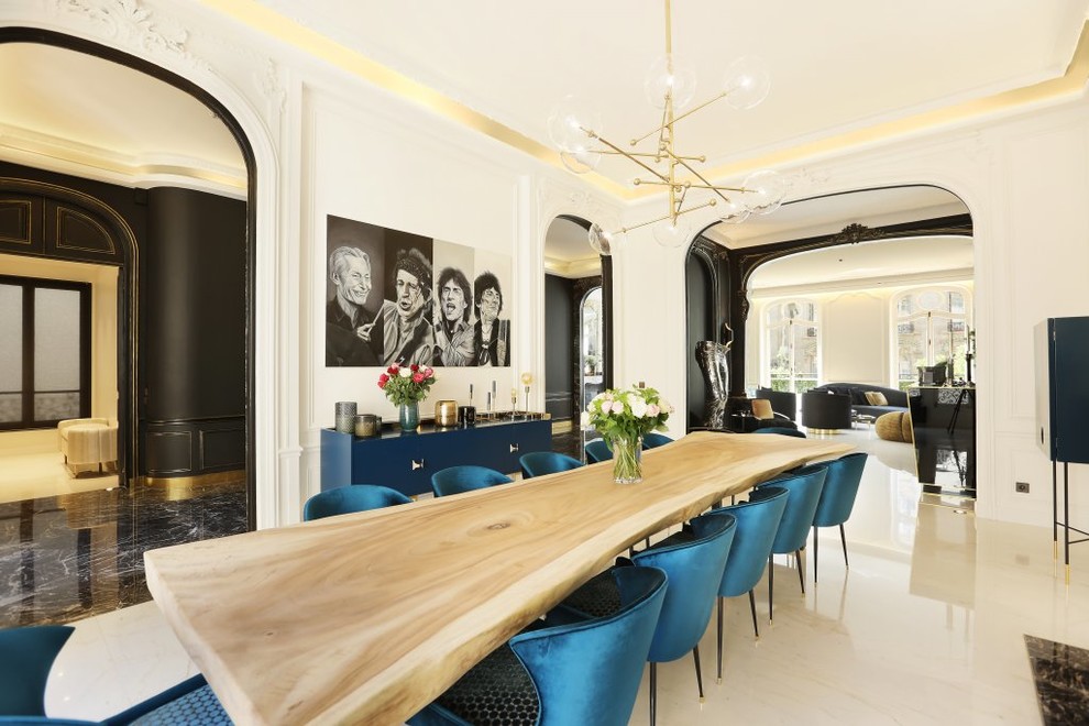 Photo of a large contemporary open plan dining in Paris with white walls, beige floor and ceramic floors.