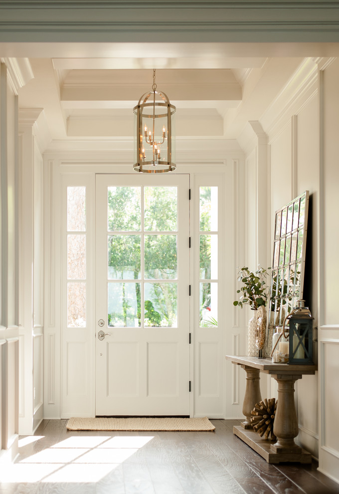 Inspiration for an arts and crafts entryway in Orlando with dark hardwood floors.