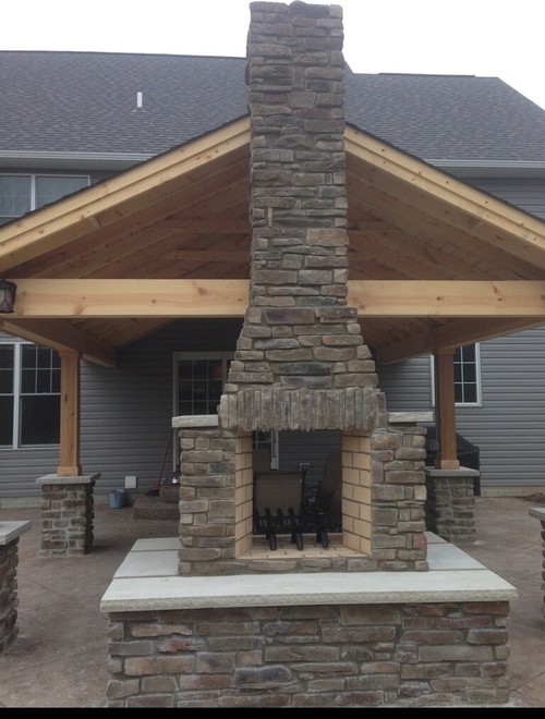 Firerock see-thru fireplace with Susquehanna Ledgestone manufactured Veener by Heritage Stone and custom limestone wall caps. Firerock see-thru fireplace with Susquehanna Ledgestone manufactured Veener by Heritage Stone and custom limestone wall caps.
