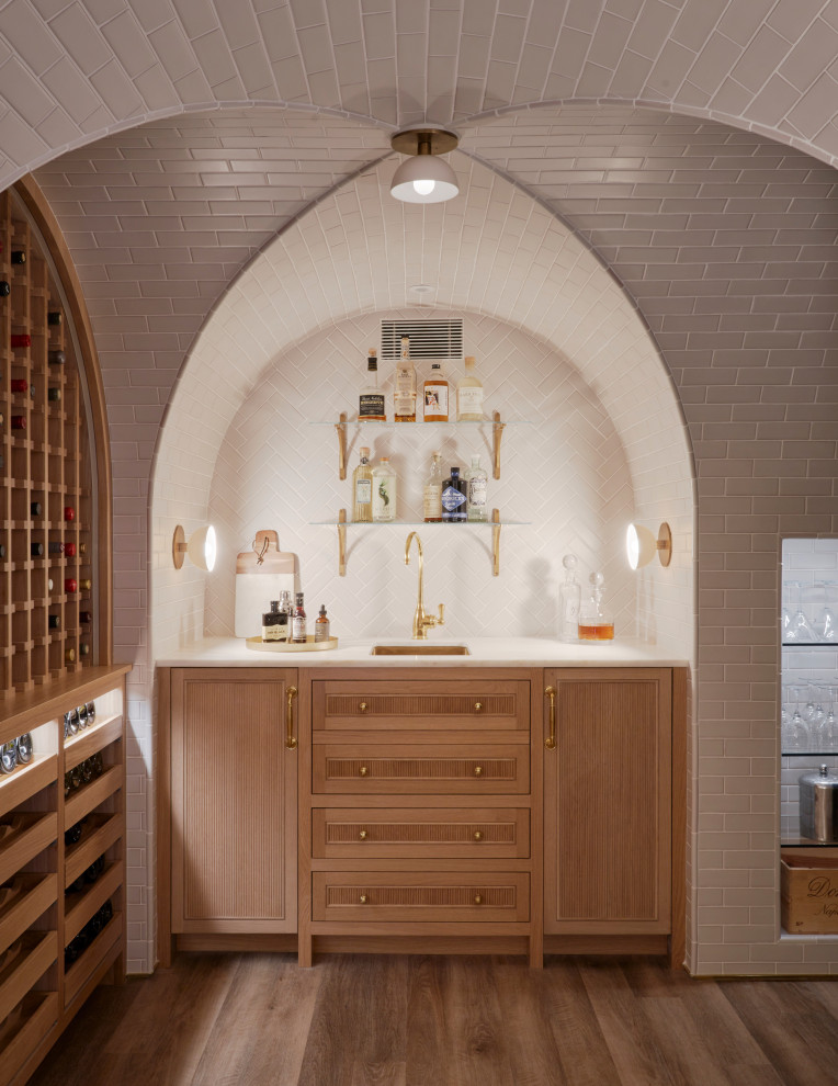 Design ideas for a medium sized midcentury wine cellar in Raleigh with light hardwood flooring and storage racks.