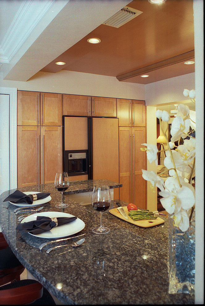 Example of a small transitional home design design in Miami