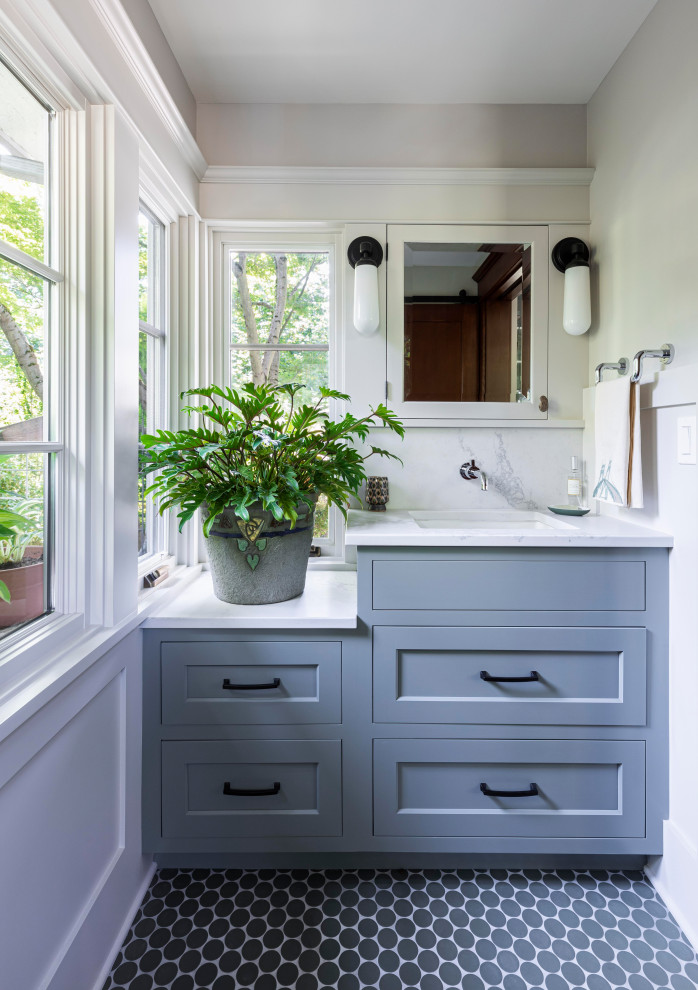 Small transitional bathroom in Portland with shaker cabinets, blue cabinets, stone slab, grey walls, ceramic floors, an undermount sink, engineered quartz benchtops, blue floor, white benchtops, a single vanity, a built-in vanity and decorative wall panelling.