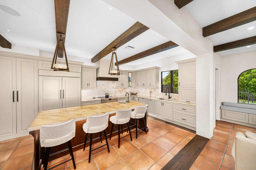 Example of a transitional kitchen design in Miami