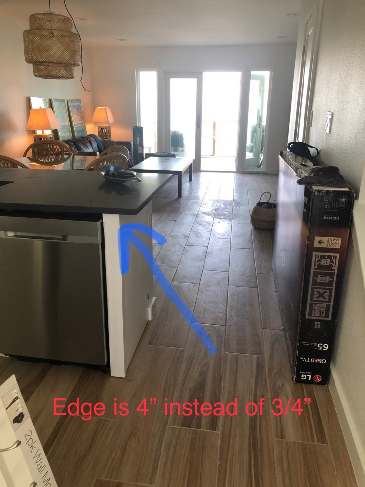 Quartz countertop installed with one long overhang