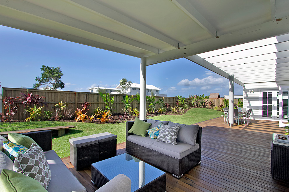 This is an example of a contemporary side yard deck in Gold Coast - Tweed with a pergola.