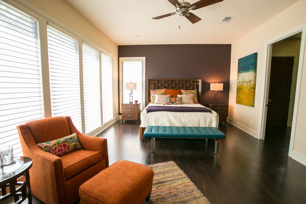 Inspiration for a large contemporary master bedroom in Houston with purple walls and vinyl floors.
