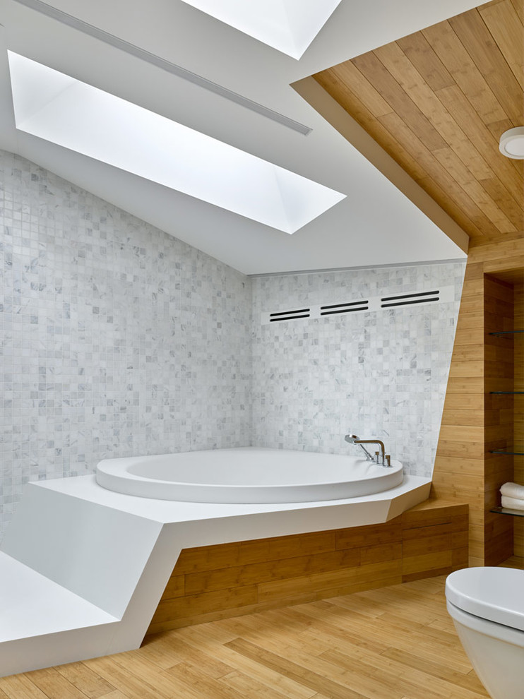 Photo of a contemporary master bathroom in Moscow with a drop-in tub, white tile, gray tile, mosaic tile, brown walls and brown floor.