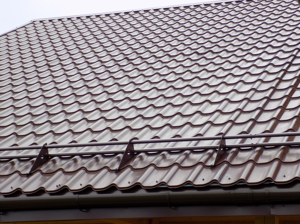 Монтаж металлочерепицы на готовую стропильную систему