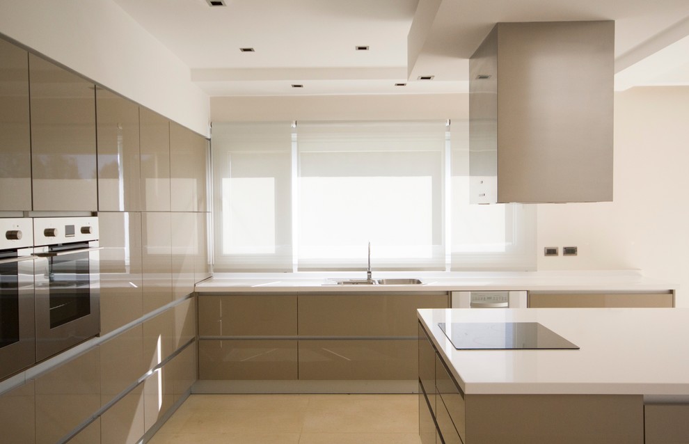 Design ideas for a large modern kitchen in Other with a drop-in sink, flat-panel cabinets, beige cabinets and with island.