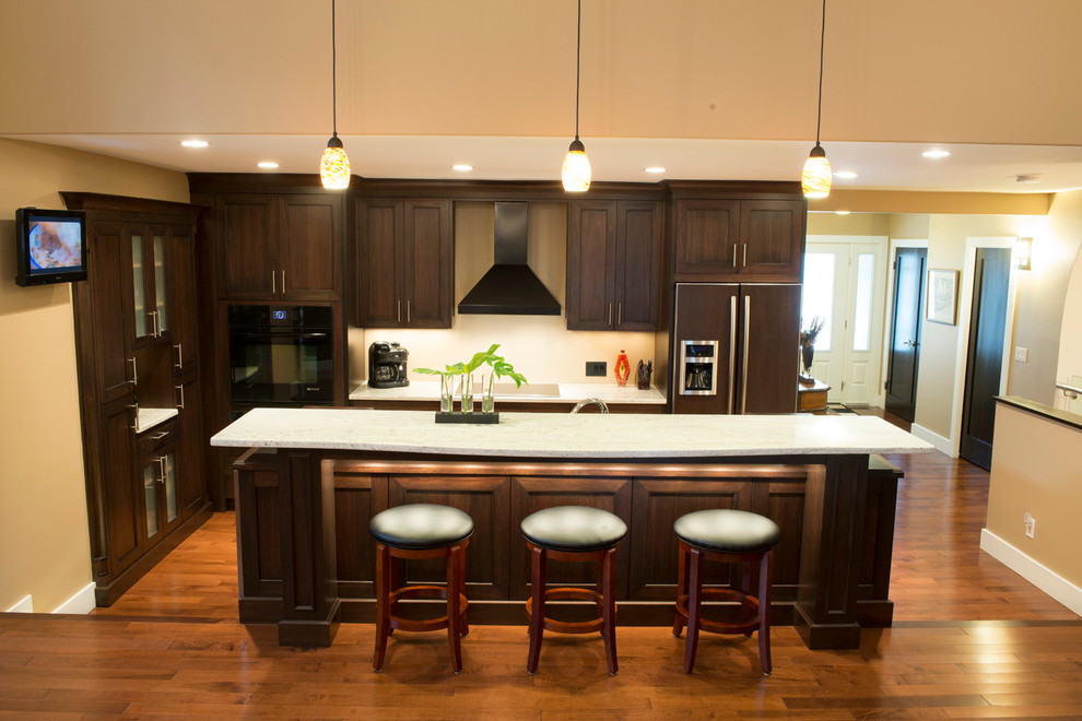 Example of a transitional kitchen design in Vancouver