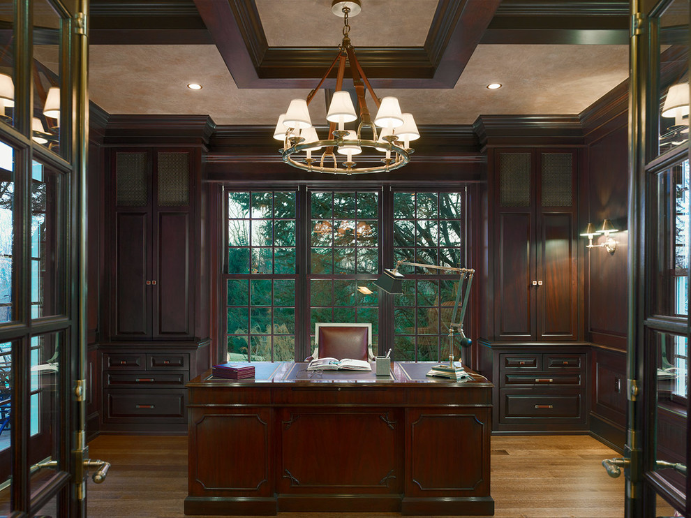 Inspiration for a traditional home office in Philadelphia with brown walls and a freestanding desk.