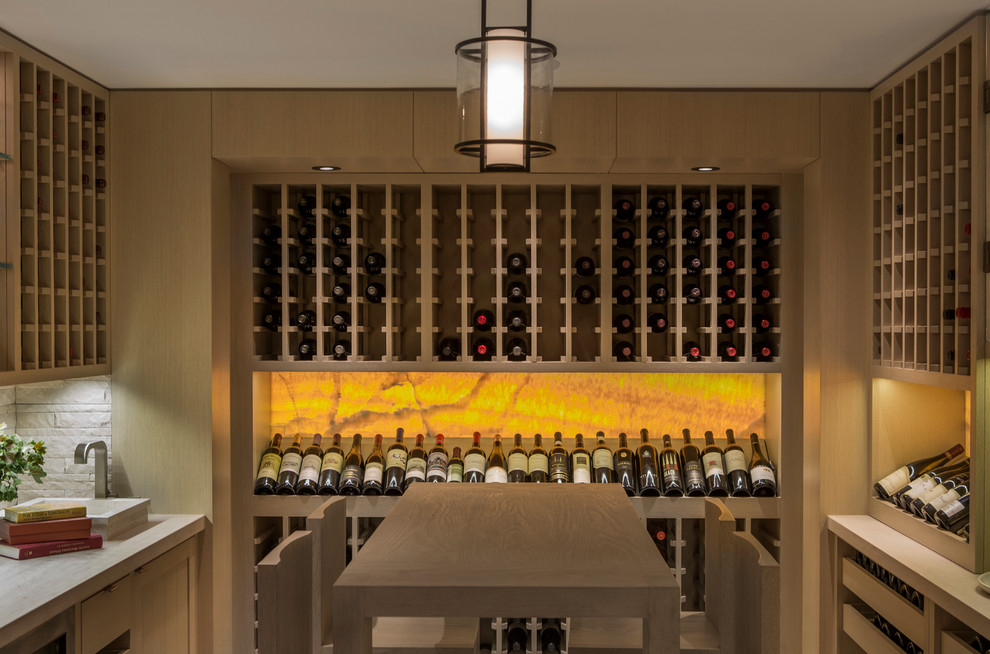 Inspiration for a mid-sized transitional wine cellar in San Francisco with storage racks.