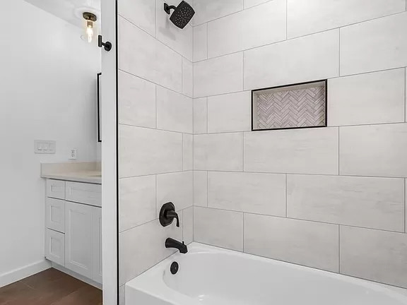 Bathroom - transitional white tile bathroom idea in Austin