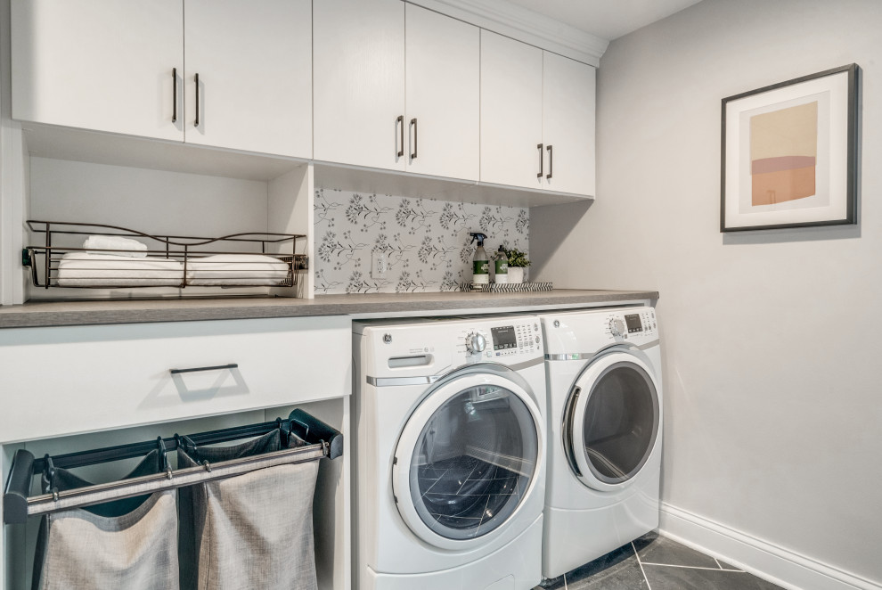 Photo of a transitional laundry room in Detroit.