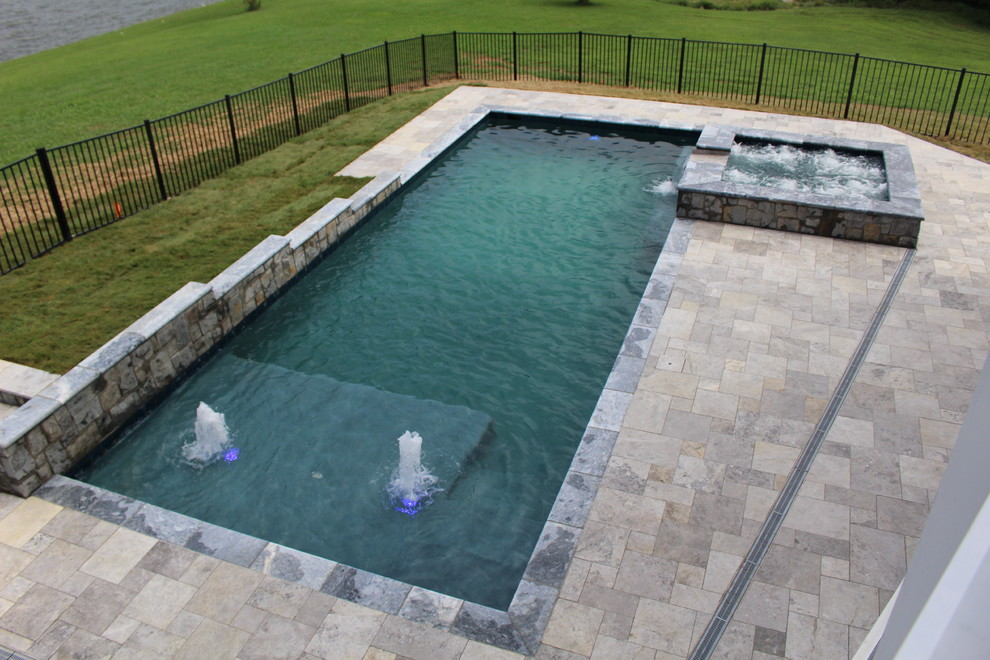Small mountain style backyard stone and rectangular natural hot tub photo in DC Metro