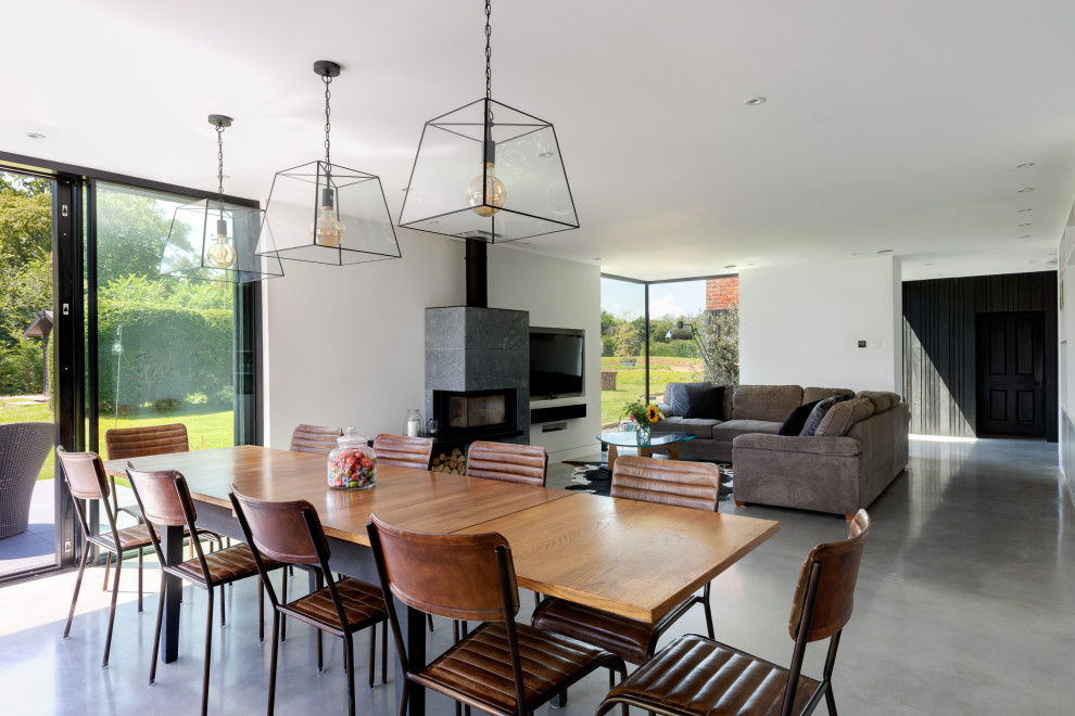 Photo of a contemporary dining room in Sussex.