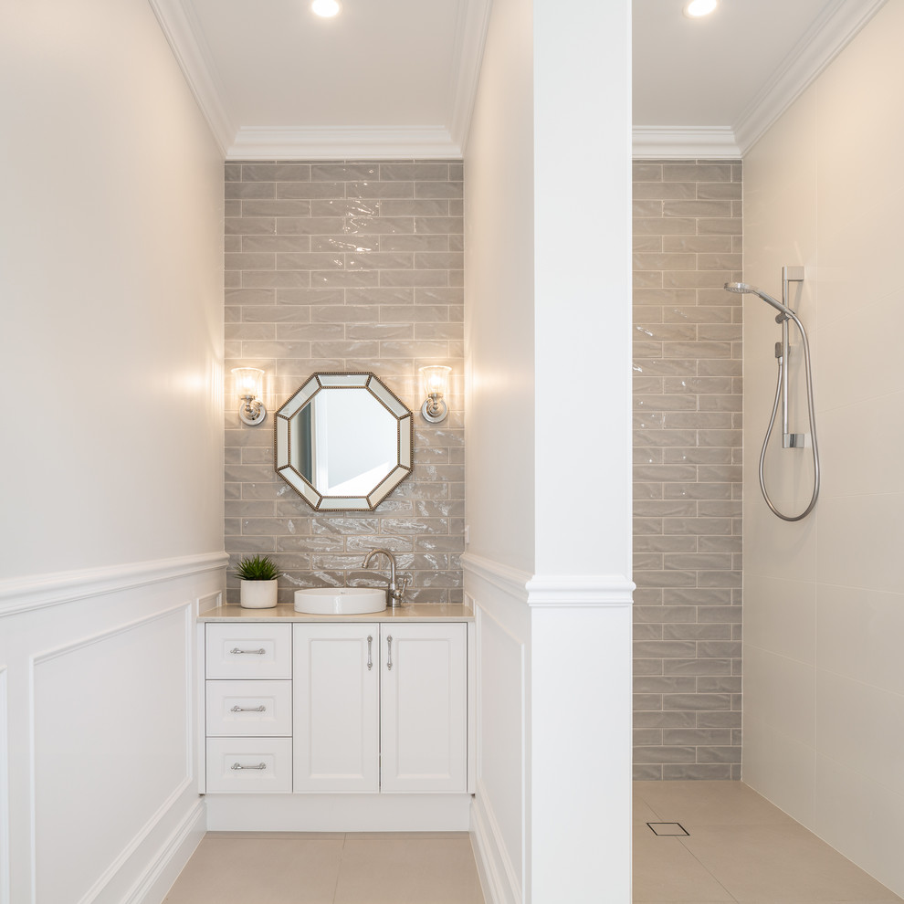 This is an example of a small beach style 3/4 bathroom in Gold Coast - Tweed with shaker cabinets, white cabinets, subway tile, grey walls, ceramic floors, a drop-in sink, beige floor and an open shower.