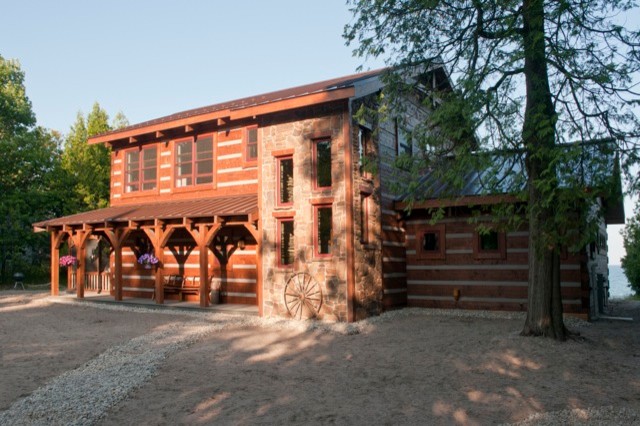 Inspiration for a large rustic exterior home remodel