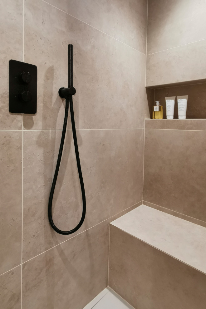 Design ideas for a medium sized contemporary cream and black ensuite bathroom in London with a walk-in shower, brown tiles, ceramic tiles, brown walls, ceramic flooring, brown floors, a hinged door and a wall niche.