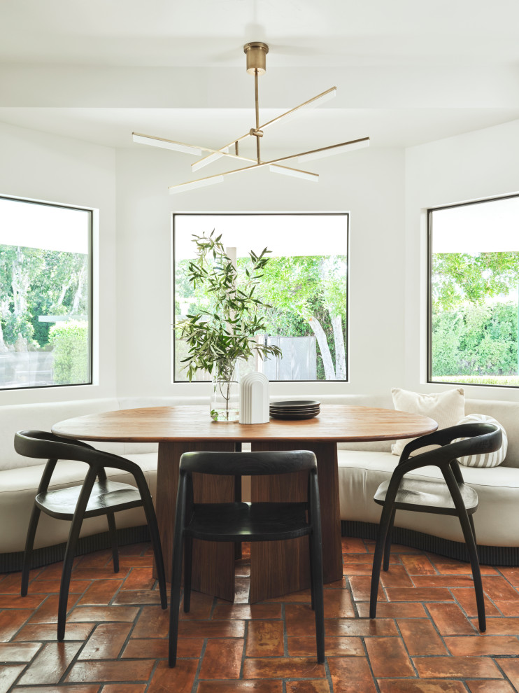 Spanish Modern - Transitional dining room photo in Los Angeles