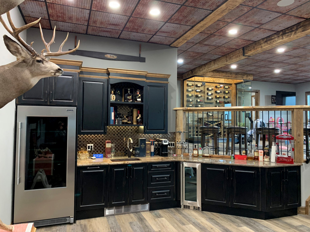 Example of a mountain style home bar design in Calgary