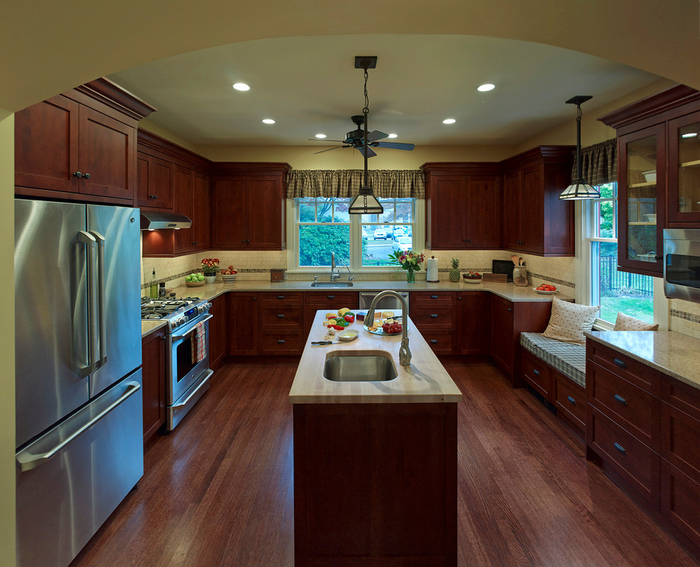 Photo of an expansive traditional u-shaped separate kitchen in Philadelphia with a drop-in sink, stainless steel appliances and with island.