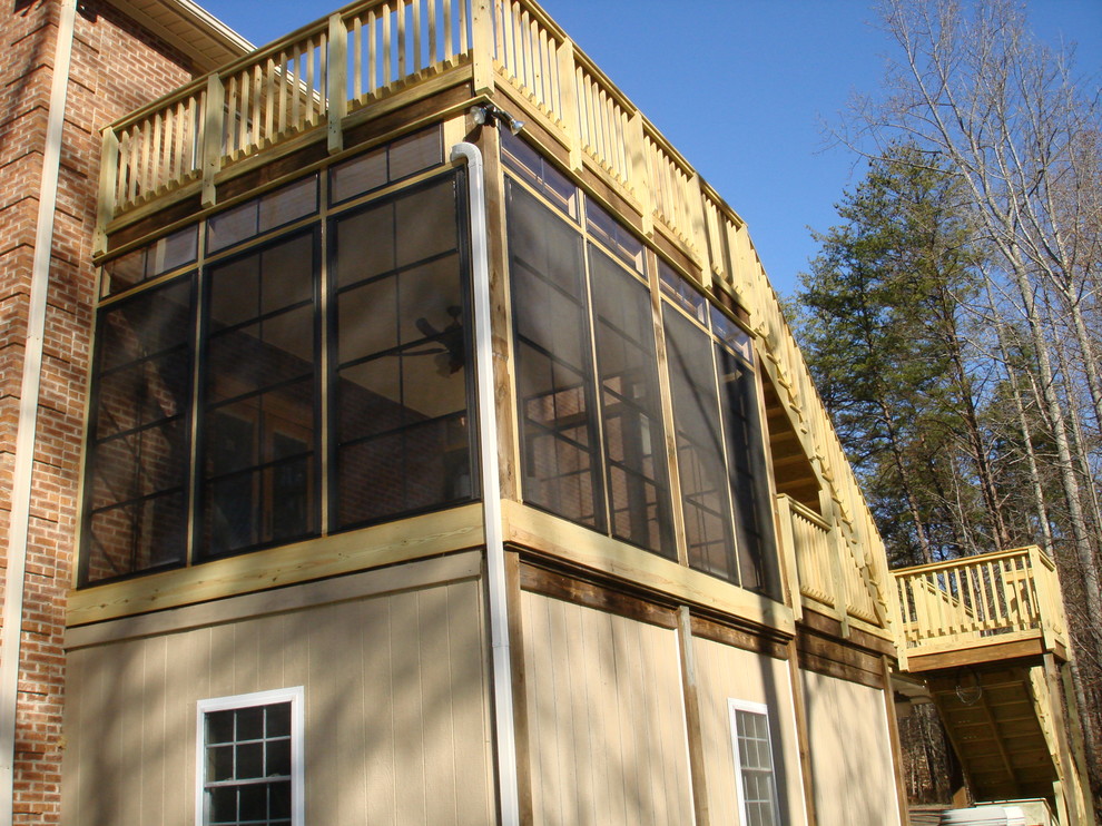 This is an example of a traditional sunroom in Other.