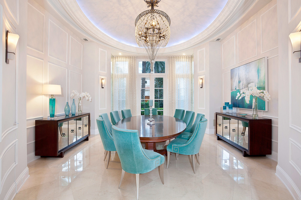 Inspiration for a transitional dining room in Miami with beige walls.