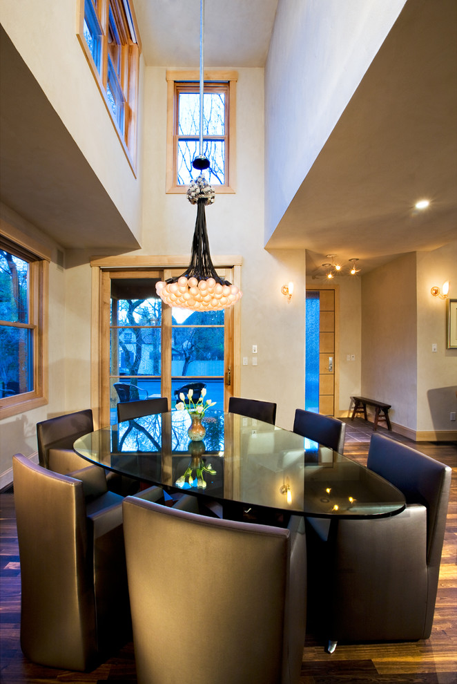 Great room - transitional dark wood floor great room idea in Denver with beige walls and no fireplace