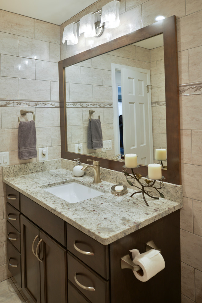 Tub/shower combo - huge modern master beige tile beige floor tub/shower combo idea in DC Metro with dark wood cabinets, a hot tub, a one-piece toilet, beige walls, an undermount sink and gray countertops