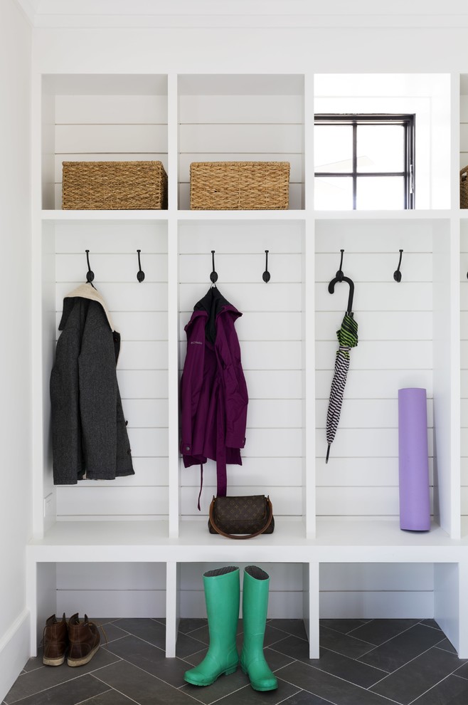 Design ideas for a small country mudroom in DC Metro with white walls, ceramic floors and grey floor.
