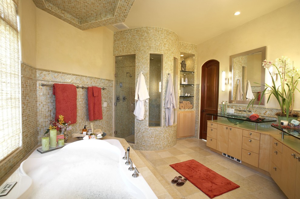 Mid-sized contemporary master bathroom in San Diego with flat-panel cabinets, light wood cabinets, a drop-in tub, an alcove shower, beige tile, mosaic tile, beige walls, porcelain floors, an integrated sink, glass benchtops, beige floor, a hinged shower door and green benchtops.