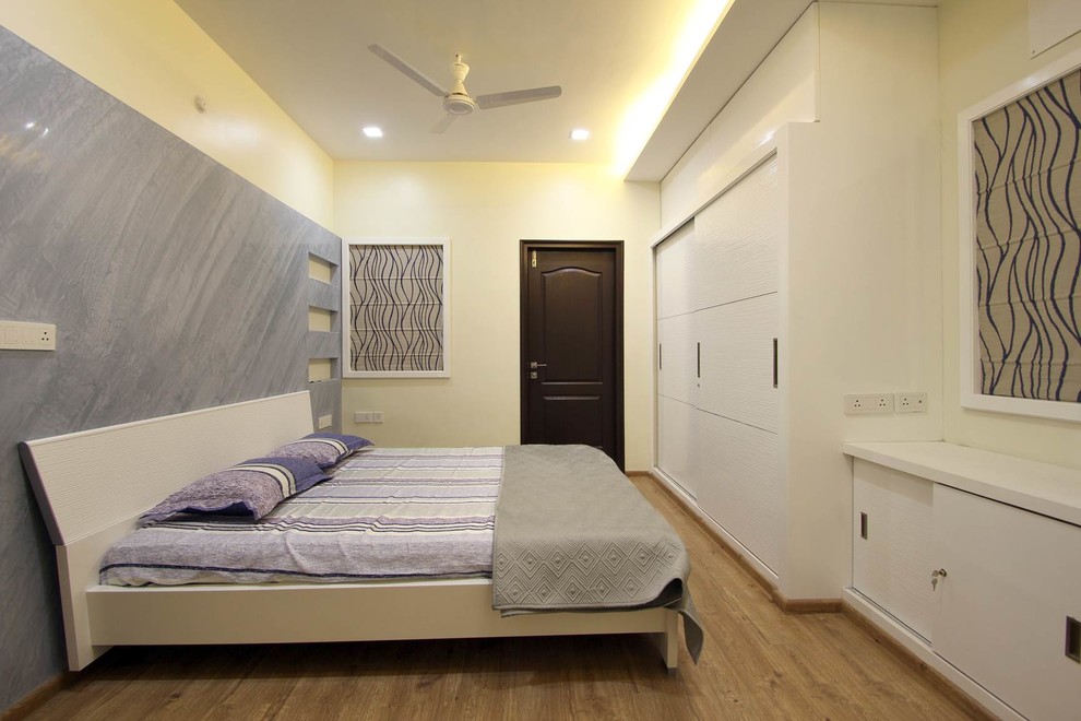 Design ideas for a contemporary bedroom in Hyderabad.