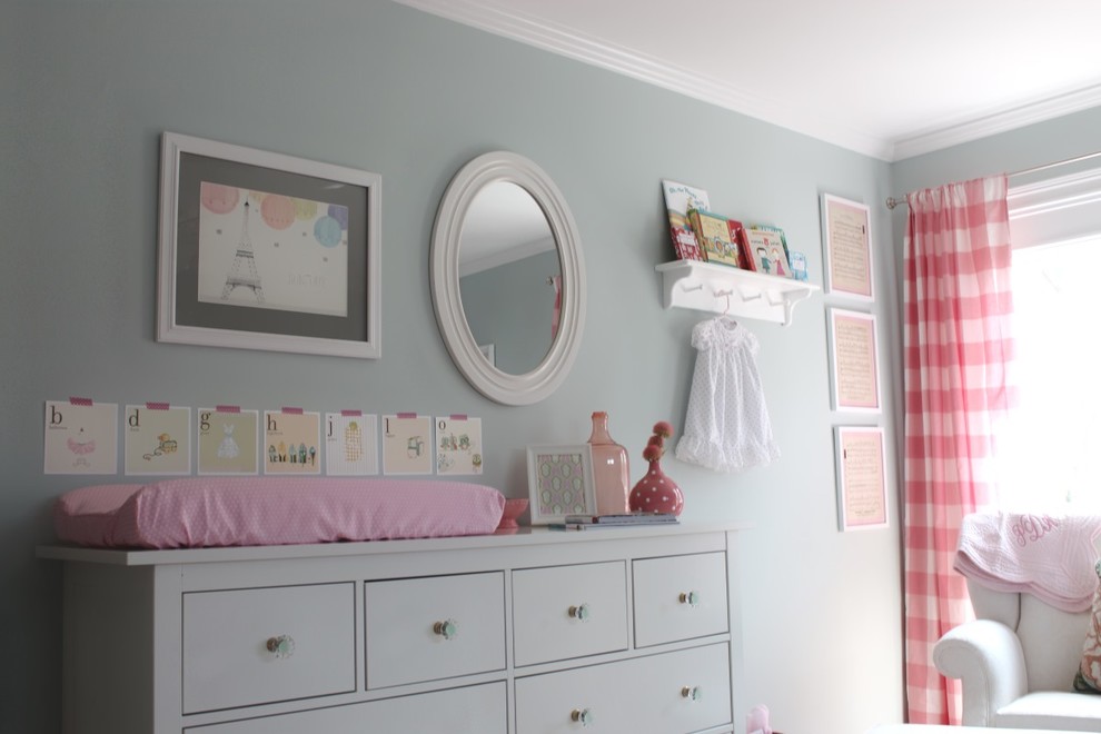 Mid-sized traditional nursery in Orange County with grey walls and medium hardwood floors for girls.