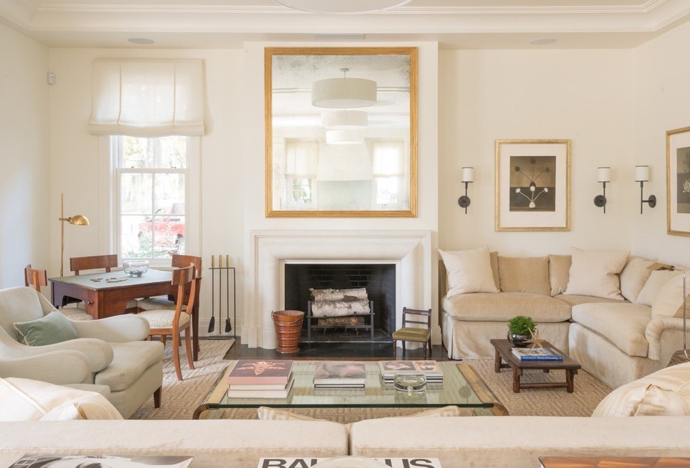 Transitional formal living room in Charleston with beige walls and a standard fireplace.