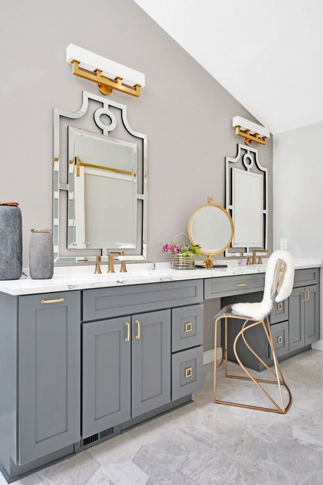 This is an example of a large transitional master bathroom in Detroit with shaker cabinets, grey cabinets, grey walls, an undermount sink, grey floor, white benchtops, a double vanity and a built-in vanity.