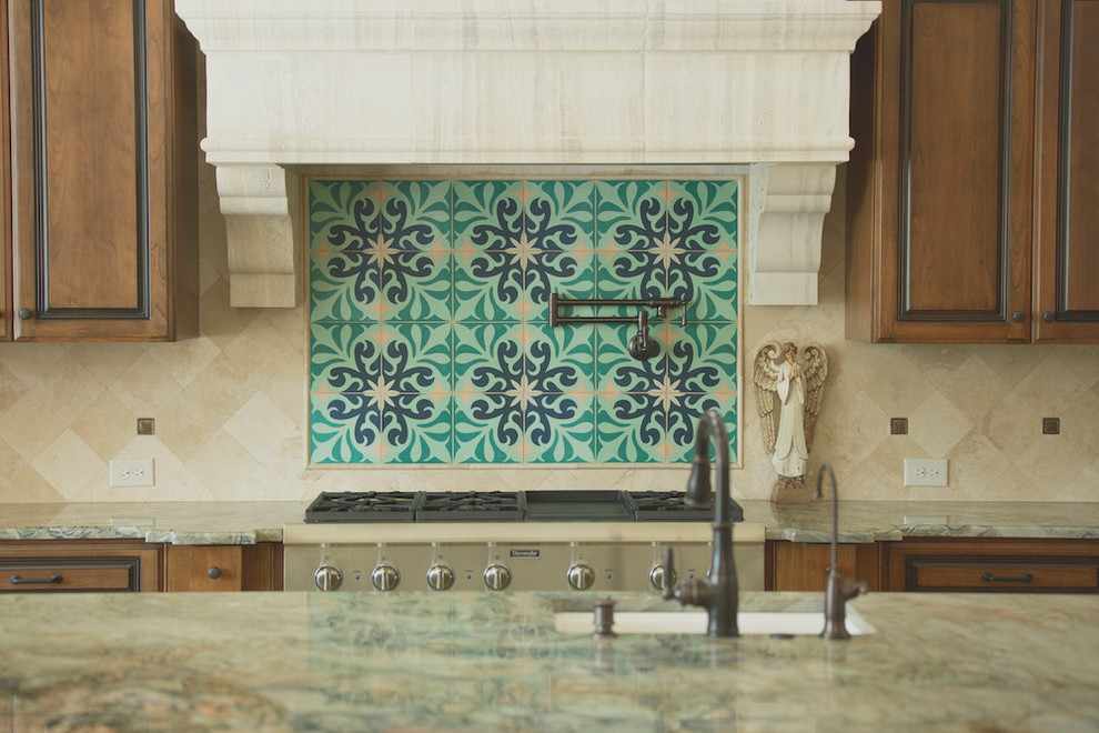 Example of a large classic eat-in kitchen design in Austin with granite countertops, ceramic backsplash, stainless steel appliances and an island