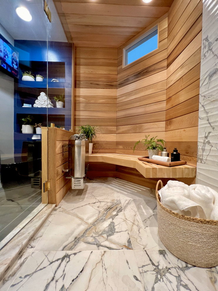 This is an example of a mid-sized eclectic wet room bathroom in Atlanta with furniture-like cabinets, grey cabinets, a two-piece toilet, black and white tile, porcelain tile, blue walls, porcelain floors, with a sauna, a vessel sink, wood benchtops, grey floor, a hinged shower door, brown benchtops, a shower seat, a single vanity, a freestanding vanity, wood and wood walls.