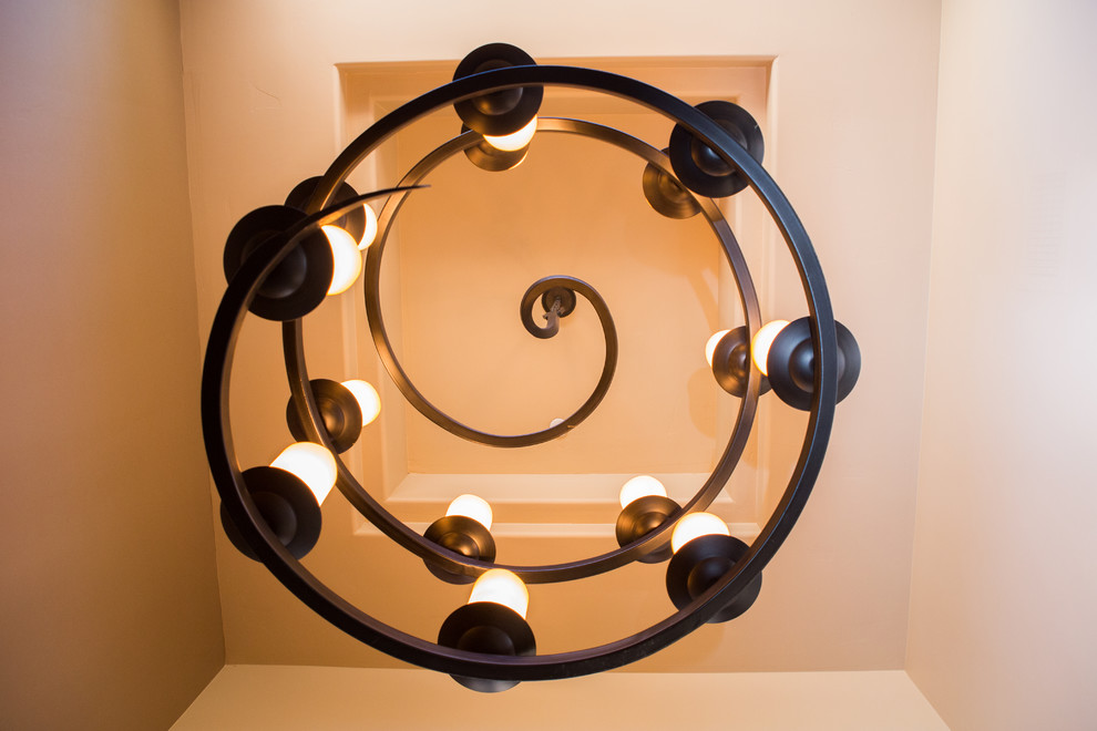 Example of a mid-sized transitional foyer design in Phoenix with beige walls