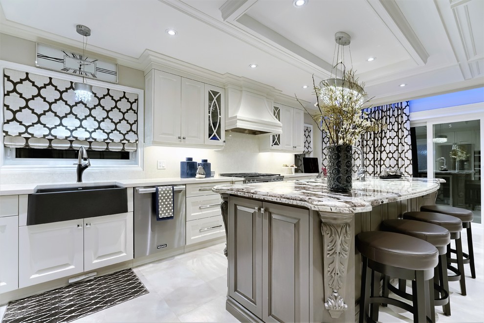 Example of a transitional kitchen design in Toronto