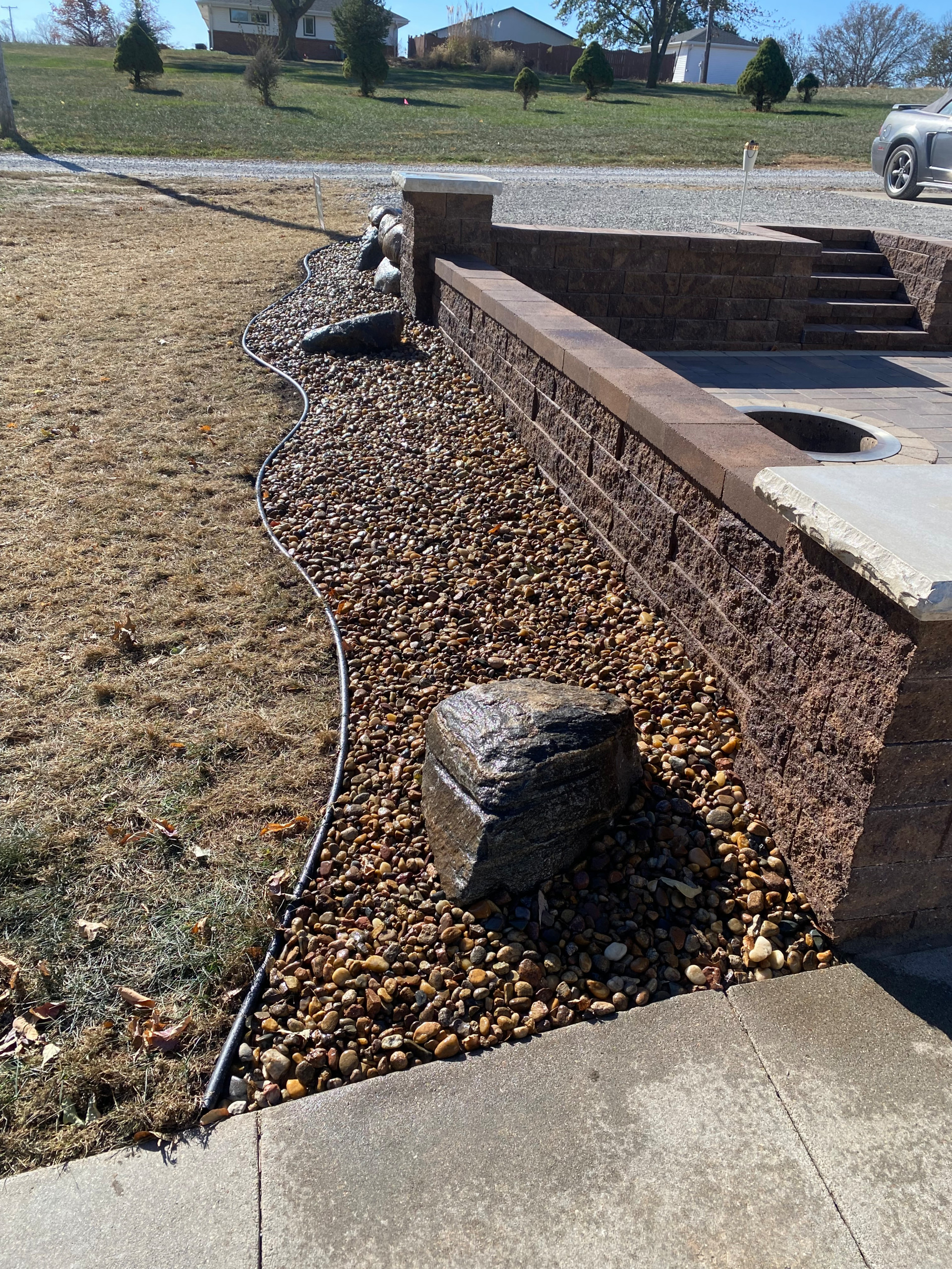 Hardscaping with Fire pit & parking extension