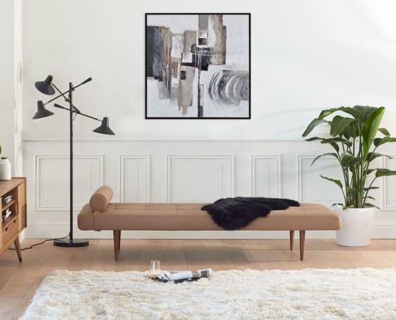 This is an example of a medium sized scandi open plan living room in Portland with white walls, light hardwood flooring and brown floors.