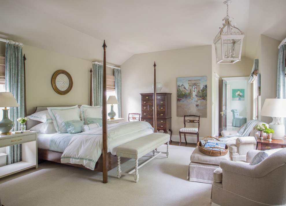 Photo of a traditional master bedroom in Boston with beige walls.
