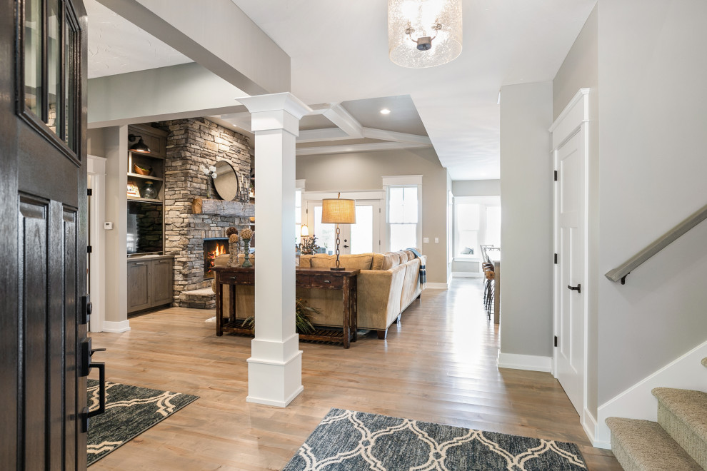 Beach style home design photo in Grand Rapids
