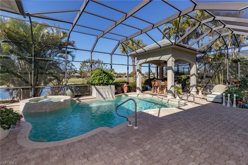Transitional pool photo in Miami