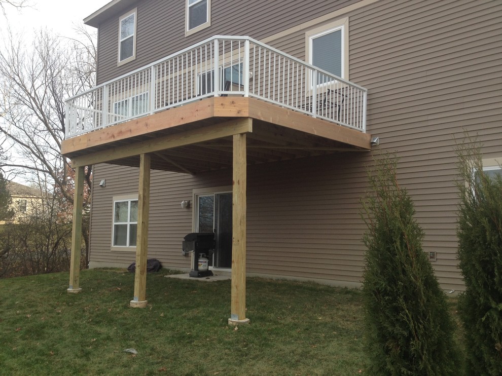 Backyard deck photo in Minneapolis