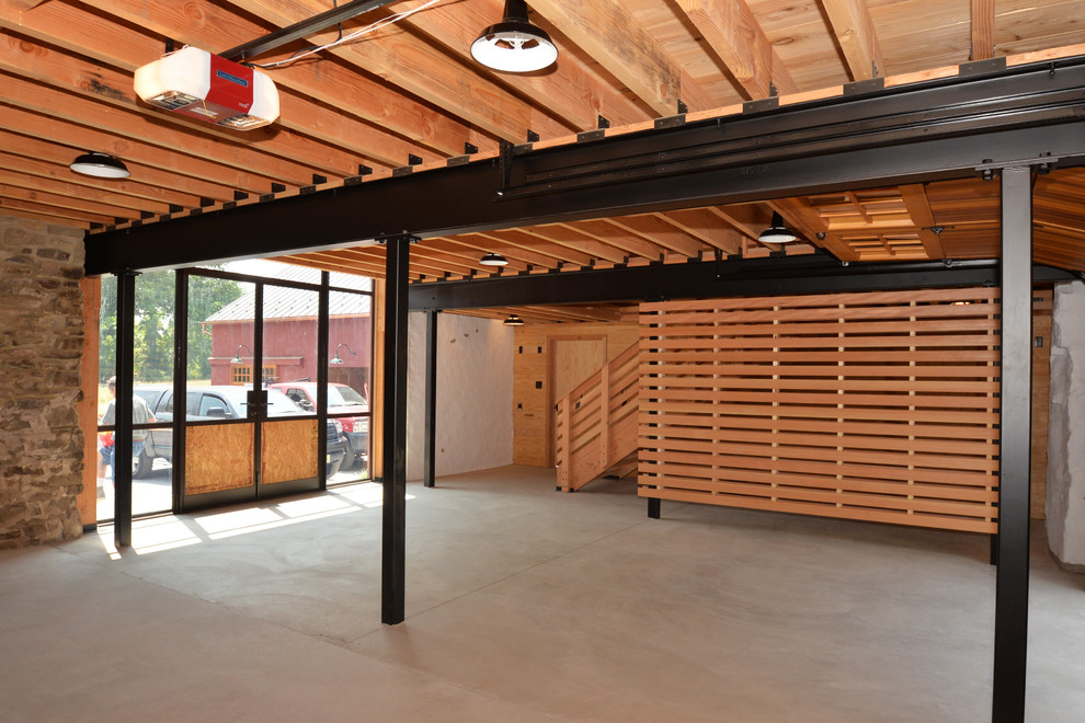 Inspiration for a large industrial detached garage in New York.