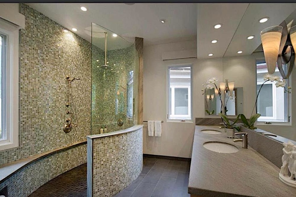 Transitional master gray tile, multicolored tile and mosaic tile doorless shower photo with open cabinets, gray cabinets, gray walls and gray countertops