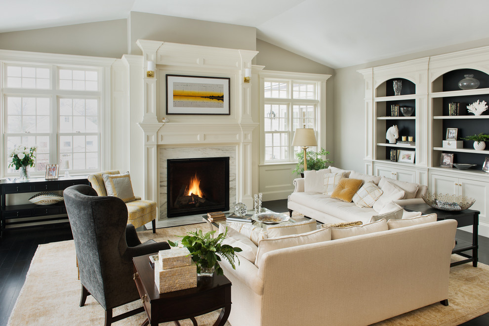 Design ideas for a large transitional formal open concept living room in Boston with grey walls, dark hardwood floors, a standard fireplace, a stone fireplace surround, no tv and black floor.