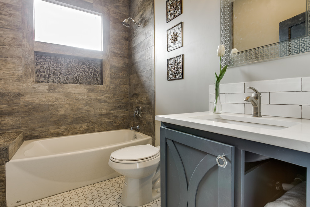 Small arts and crafts 3/4 white tile and ceramic tile ceramic tile alcove bathtub photo in Austin with shaker cabinets, gray cabinets, gray walls, an undermount sink and quartz countertops